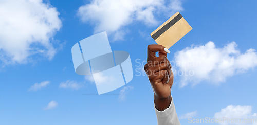 Image of hand of african american woman with credit card