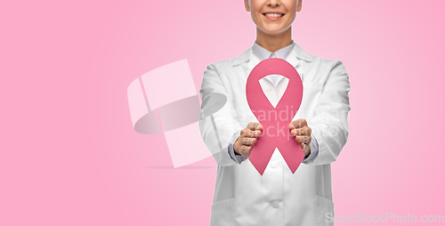 Image of female doctor with breast cancer awareness ribbon