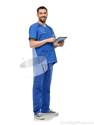 Image of smiling doctor or male nurse using tablet computer