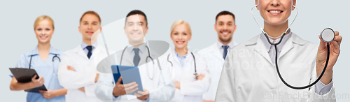 Image of close up of smiling female doctor with stethoscope