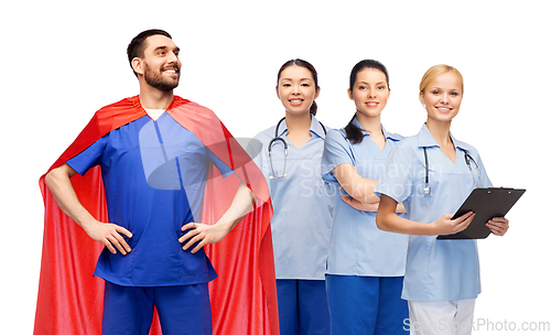 Image of male doctor in superhero cape and female nurses