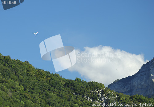 Image of A glider flying over Alps