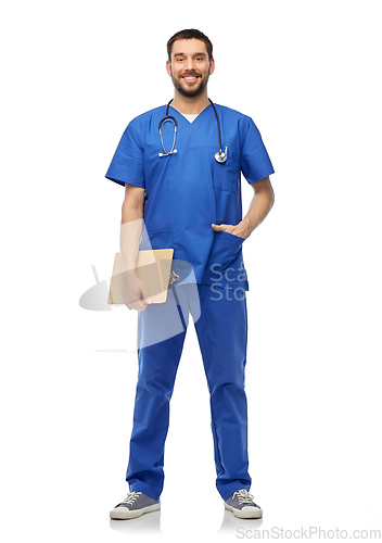 Image of smiling doctor in blue uniform with clipboard