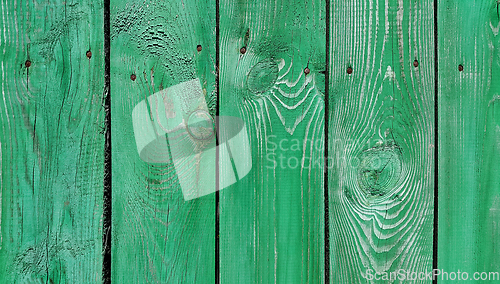 Image of Texture of weathered wooden green painted fence