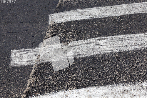 Image of pedestrian crossing artificial roadside road