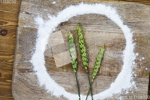 Image of three green wheat