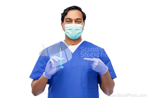 Image of indian male doctor in mask with vaccine in syringe