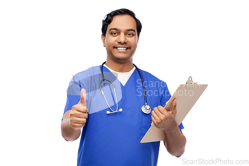 Image of smiling doctor or male nurse showing thumbs up