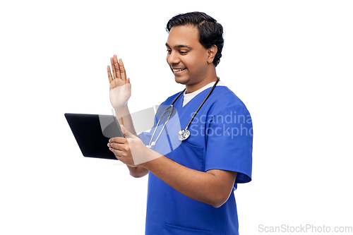 Image of doctor or male nurse has video call on tablet pc