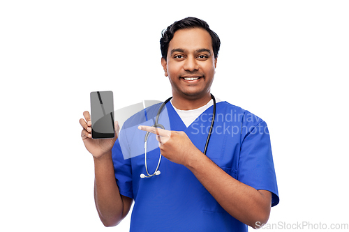 Image of happy indian doctor or male nurse with smartphone