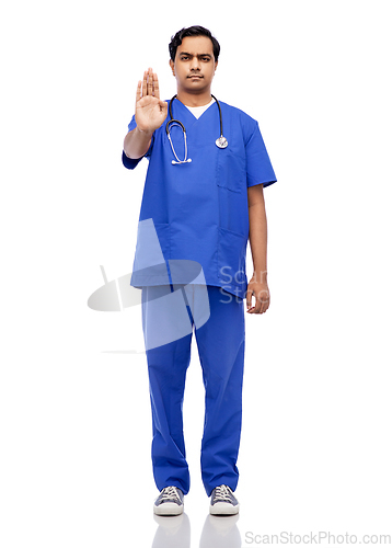 Image of indian doctor or male nurse showing stop gesture