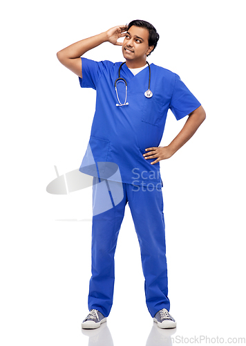 Image of stressed doctor or male nurse in blue uniform