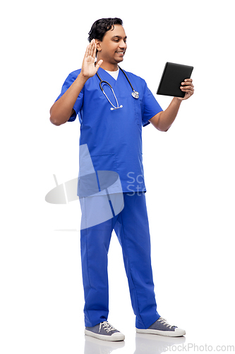 Image of doctor or male nurse has video call on tablet pc