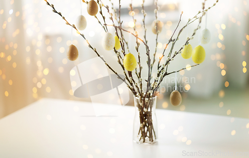 Image of pussy willow branches decorated by easter eggs