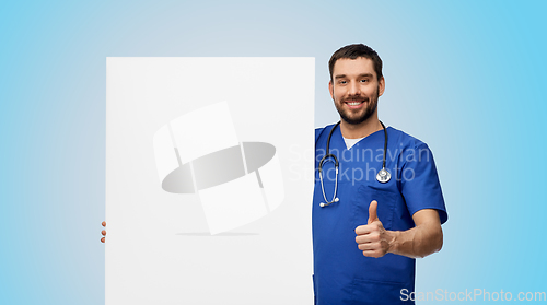 Image of male doctor with white board showing thumbs up
