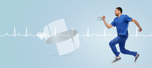 Image of doctor or male nurse with stethoscope jumping