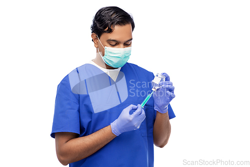 Image of indian doctor in mask with syringe and medicine