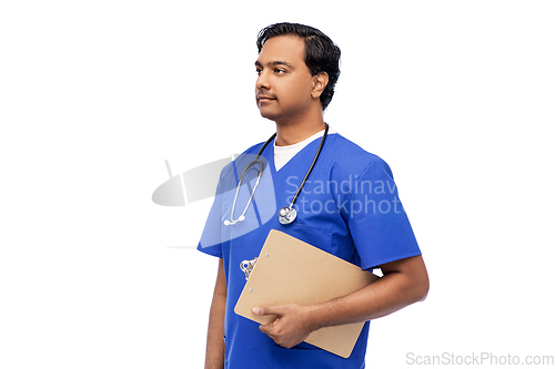 Image of indian male doctor with clipboard and stethoscope