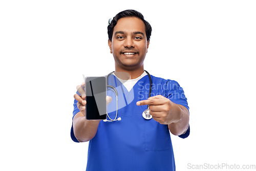 Image of smiling doctor or male nurse with smartphone