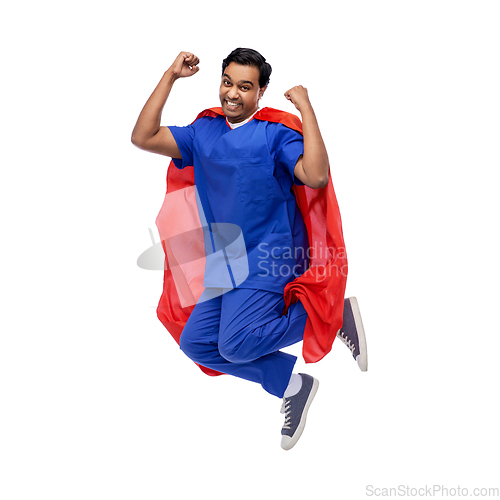 Image of doctor or male nurse in superhero cape jumping