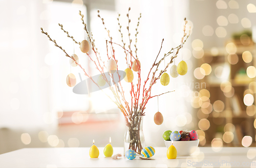 Image of pussy willow branches decorated by easter eggs