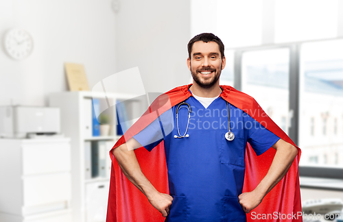 Image of smiling doctor or male nurse in superhero cape