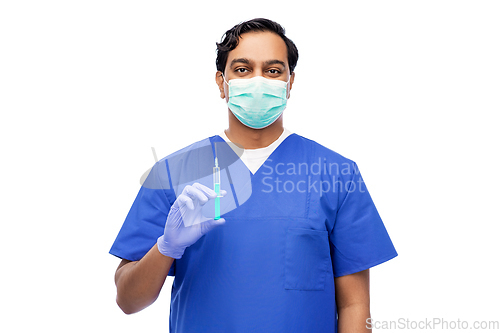 Image of indian male doctor in mask with vaccine in syringe