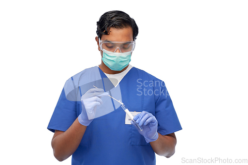 Image of male doctor in mask with cotton swab and test tube