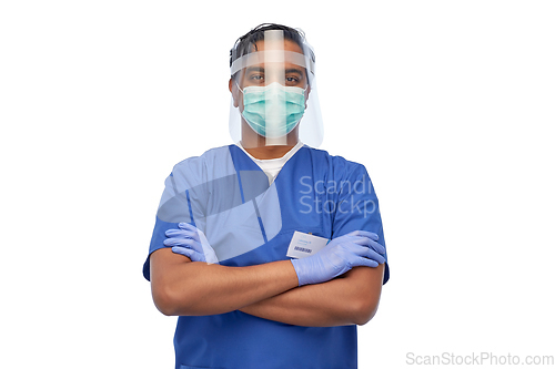 Image of indian male doctor in mask and face shield