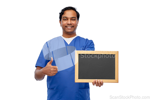 Image of happy indian male doctor or nurse with chalkboard