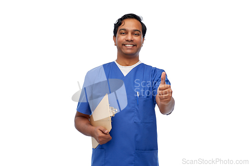 Image of smiling doctor or male nurse showing thumbs up