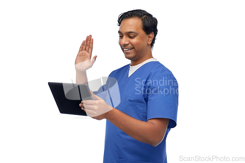 Image of doctor or male nurse has video call on tablet pc