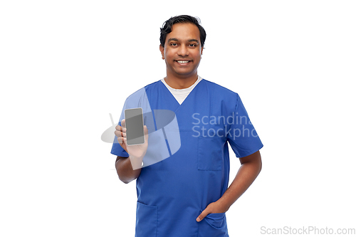 Image of smiling doctor or male nurse with smartphone