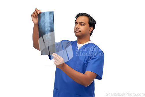 Image of indian doctor or male nurse with x-ray