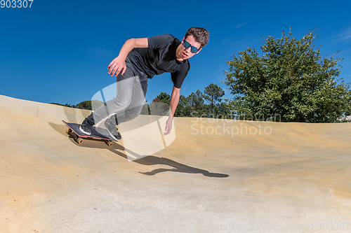 Image of Skateboarder on a pump track park