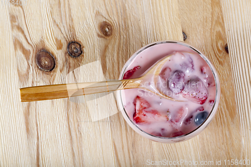 Image of ripe blueberries in yogurt