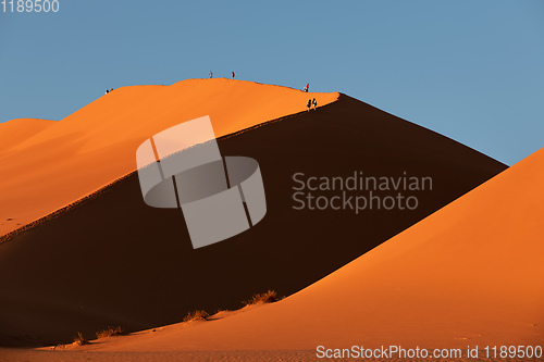 Image of peoples on dune in Hidden Vlei, Namibia, Africa