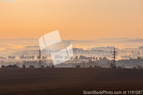 Image of Autumn foggy sunrise landscape