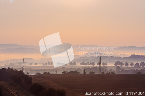 Image of Autumn foggy sunrise landscape