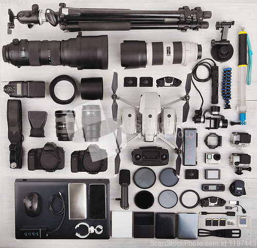 Image of top view of complete photographer professional equipment