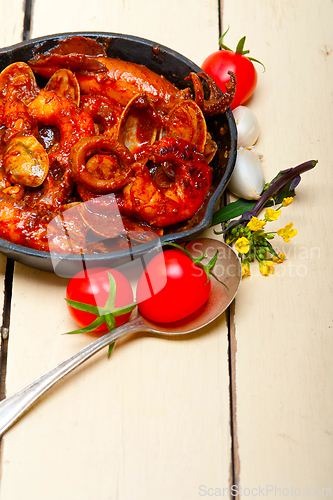 Image of fresh seafoos stew on an iron skillet