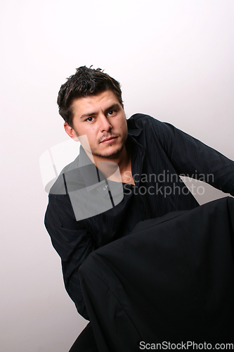 Image of Male Model on chair