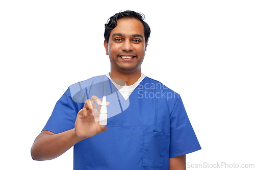 Image of smiling indian male doctor or nurse with medicine