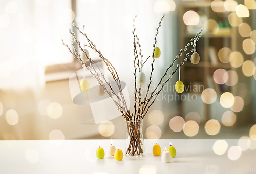 Image of pussy willow branches decorated by easter eggs