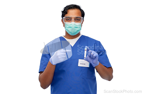 Image of indian male doctor in mask with blood in test tube