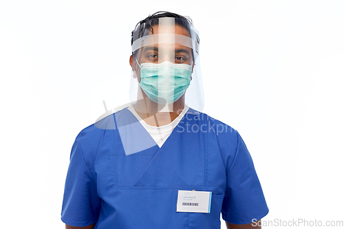 Image of indian male doctor in mask and face shield