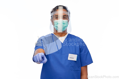 Image of indian male doctor in mask and face shield