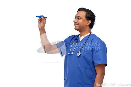 Image of indian male doctor writing something with marker