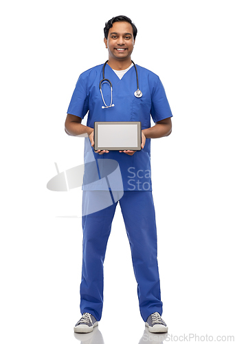 Image of happy doctor or male nurse showing tablet computer