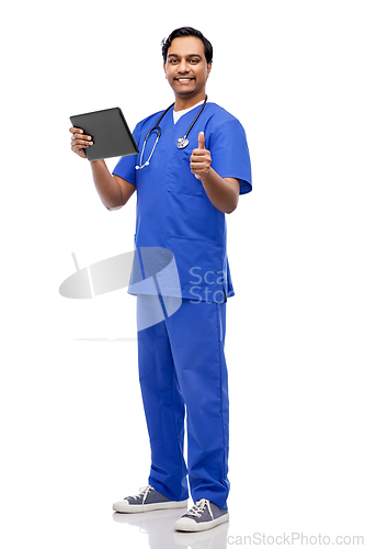 Image of male doctor with tablet pc showing thumbs up